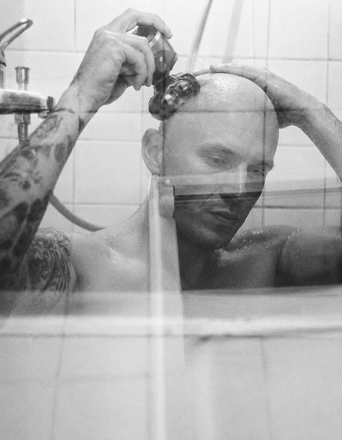 Man in bathroom mirror